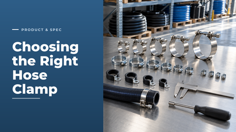 Quality-control bench in a hose warehouse with rows of stainless T-bolt hose clamps, zinc-plated worm drive clips, mini hose clips and rubber-lined P clips beside a silicone hose, calipers and a hose clip driver
